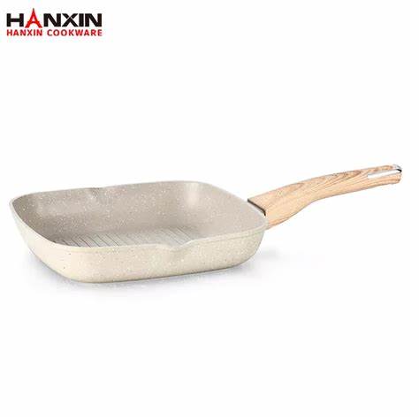 W jaki sposób aluminiowa patelnia grillowa z powłoką nieprzywierającą poprawia wydajność grillowania w pomieszczeniach? W jaki sposób aluminiowa patelnia grillowa z powłoką nieprzywierającą poprawia wydajność grillowania w pomieszczeniach?